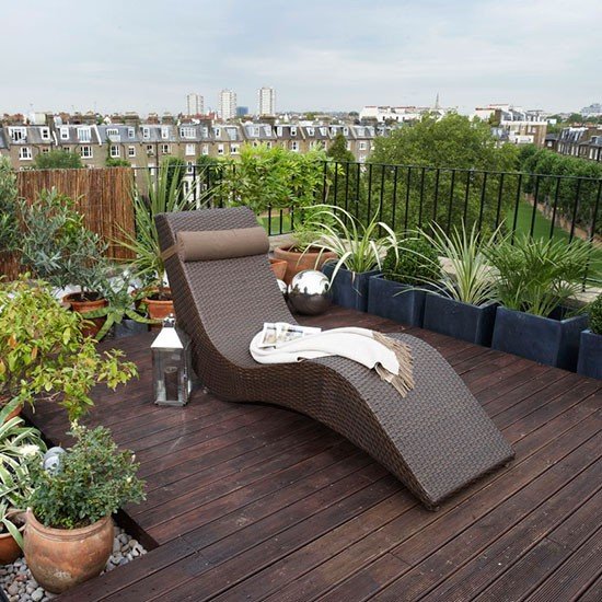 Varanda de apartamento transformada em jardim