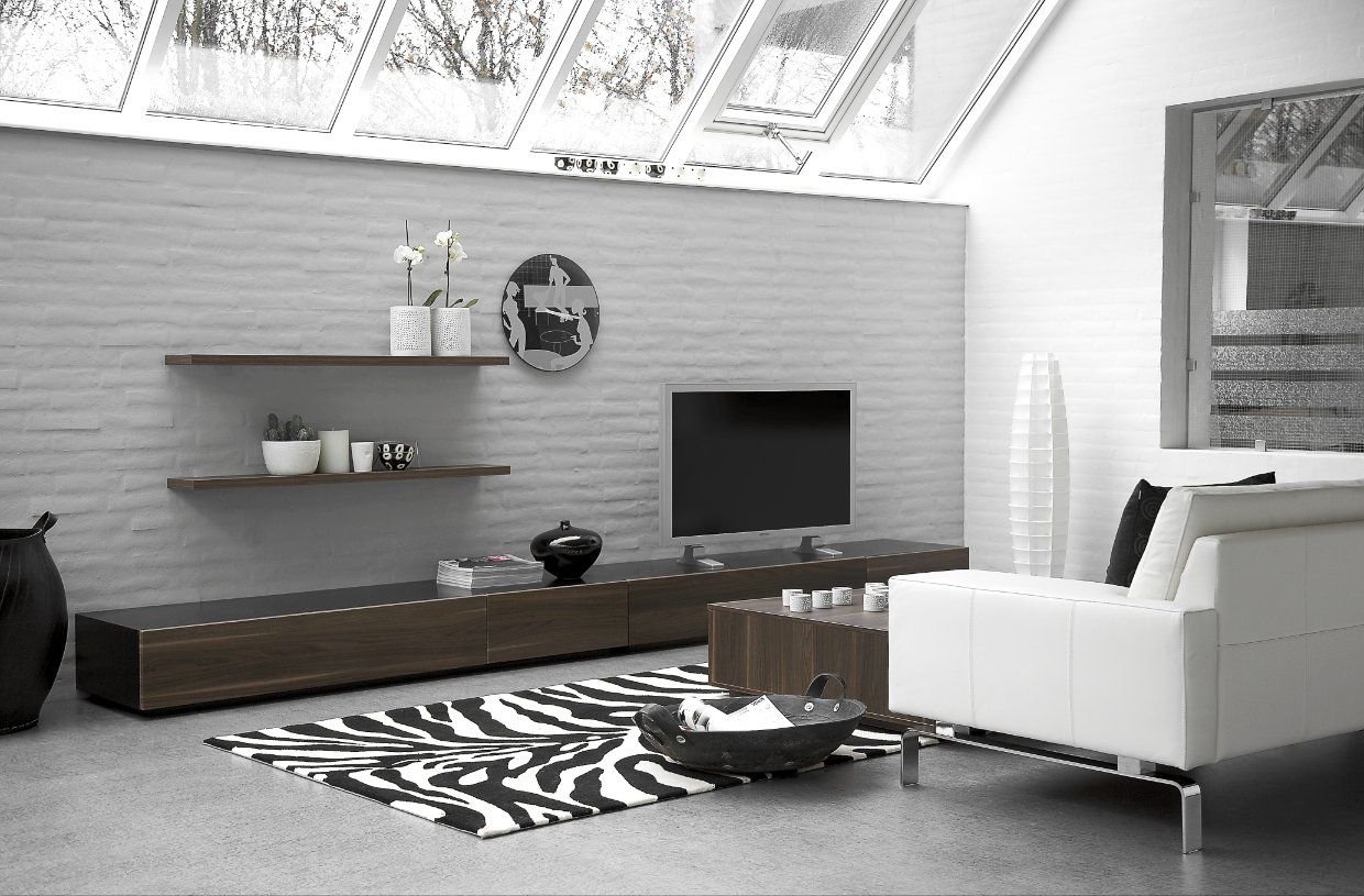Sala minimalista com móveis e estofados organizados